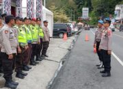 Personel Polres Simalungun Siap Siaga Amankan Arus Balik Libur Tahun Baru di Pos Yan-II Pantai Bebas Parapat: Menjaga Keamanan dan Ketertiban di Tengah Keramaian